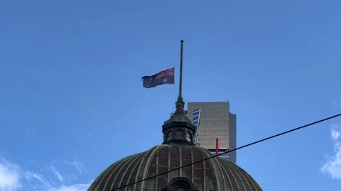 Flag have been flown at half-mast at Flinders Street Station. Stock Footage 208851497