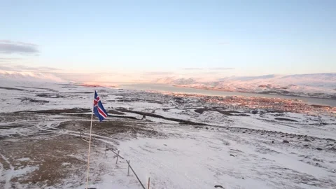 Flag of Iceland Upon a Mountain During Winter Stock Footage 237938624