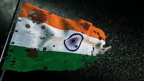 The flag of India is torn and marked with the virus of covid-19 . Stockbeeldmateriaal 127197925