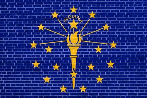 Flag of Indiana on brick wall texture background 스톡 일러스트