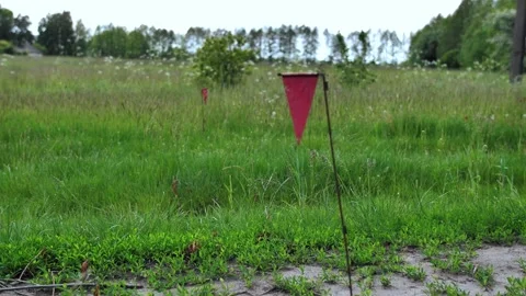 Flag indicating mines in a minefield. Stock Footage 196417364