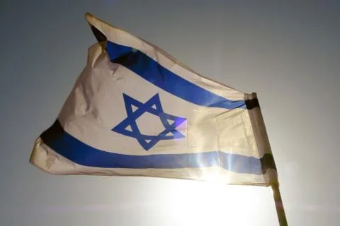 Flag of Israel against the sky develops in the wind Stock Photos