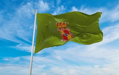 Flag of Jaen , Spain at cloudy sky background on sunset, panoramic view. Span Stock Illustration
