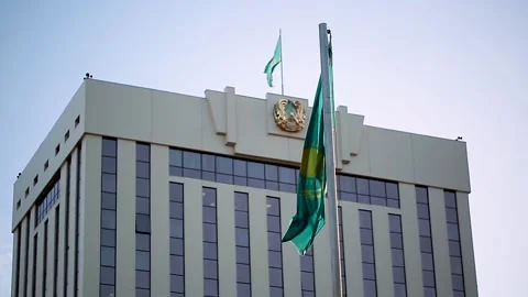 The flag of Kazakhstan is developing in the wind against. Stock-Footage 143589502