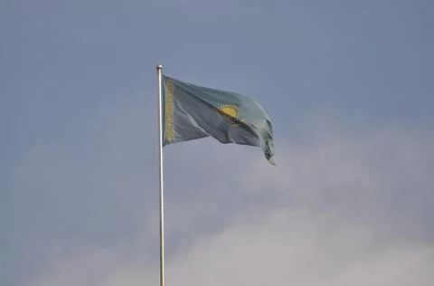 The flag of Kazakhstan develops in the wind Stock Photos