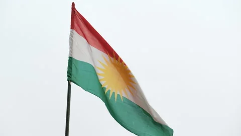 Flag of Kurdistan waved in Slow Motion in a refugee camp. Stock Footage 158380164