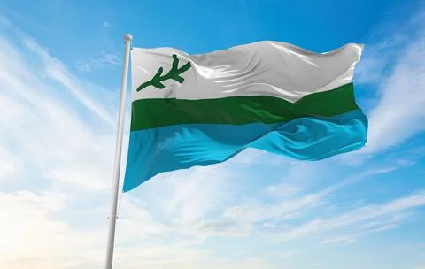 Flag of Labrador , Canada at cloudy sky background on sunset, panoramic view. Stock Illustration