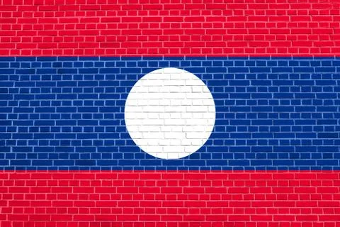 Flag of Laos on brick wall texture background Stock Photos