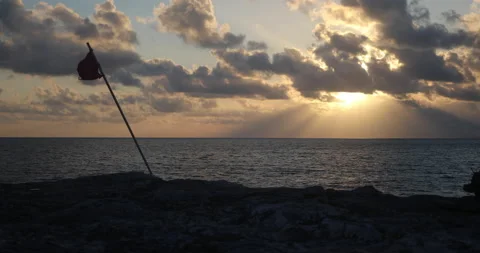 Flag On Leaning Stick With Sun And Rays Stock-Footage 155910079