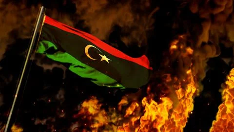 Flag of Libya on burning fire background - hard times concept Stock Illustration