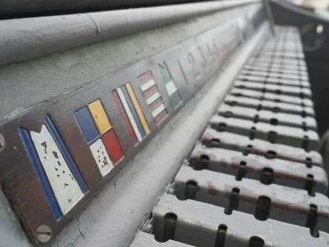 Flag locker aboard a warship. Stock Photos