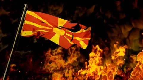 Flag of Macedonia on burning fire backdrop - hard times concept Stock-Illustration
