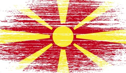 Flag of Macedonia with old texture. Vector Illustrazione stock