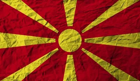 Flag of Macedonia with old texture. Vector Illustrazione stock