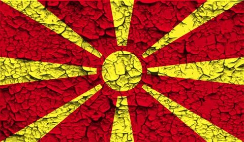 Flag of Macedonia with old texture. Vector Stock Illustration
