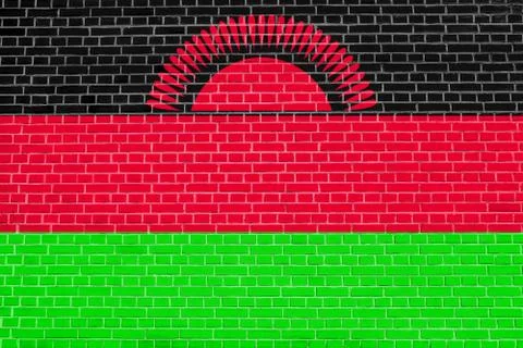 Flag of Malawi on brick wall texture background Stock Photos
