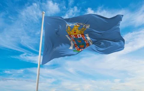 Flag of Melilla , Spain at cloudy sky background on sunset, panoramic view. S Stock Illustration