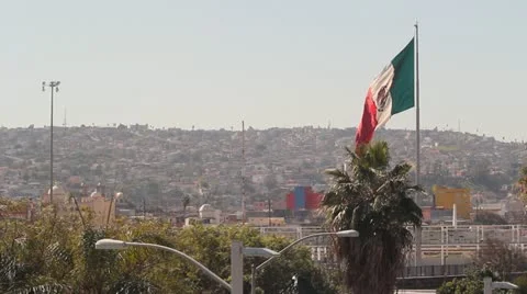 Flag of Mexico over Tijuana 1 Stock-Footage 21845241