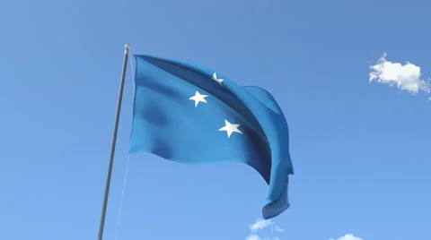 The flag of Micronesia Waving on the Wind. Stock Footage 47065361