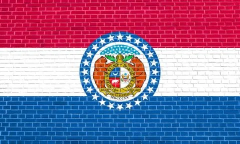Flag of Missouri on brick wall texture background 스톡 일러스트