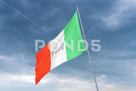 Flag mockup waves in the wind with dark clouds in the background PSD Template