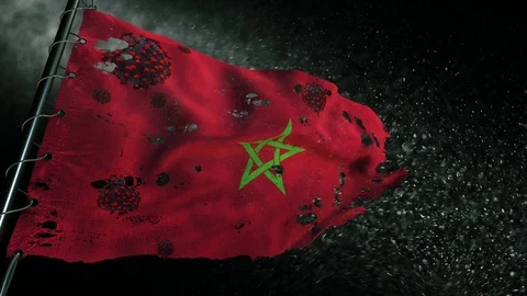 The flag of Morocco is torn and marked with the virus of covid-19 . 스톡 동영상 127198510