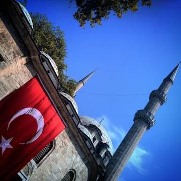Flag on the mosque wall Stock Photos