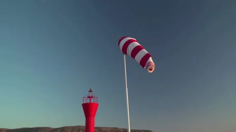 Flag moving in wind at the airport Stock Footage 145811771