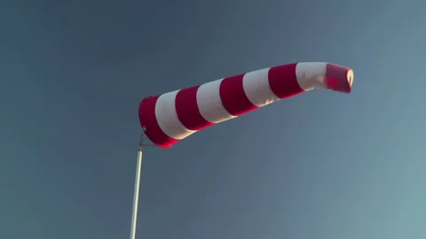 Flag moving in wind at the airport Stock Footage 145812136