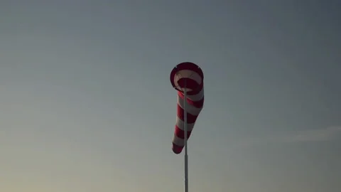 Flag moving in wind at the airport Stock Footage 145812664