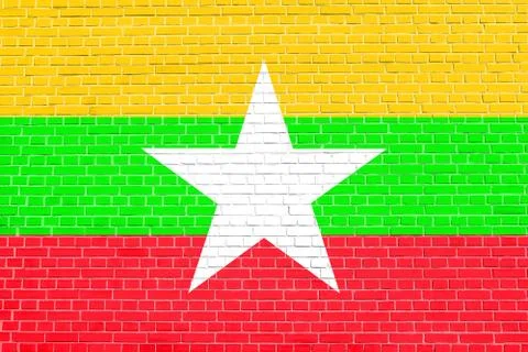 Flag of Myanmar on brick wall texture background. Myanmar national flag. Stock Illustration