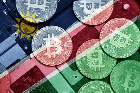 Flag of namibia on the bitcoins with computer electronic circuit board back.. Stock Photos
