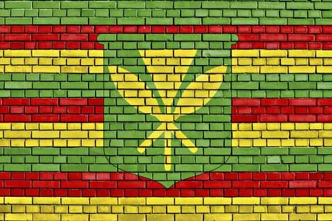 Flag of Native Hawaiians painted on brick wall Stock Illustration