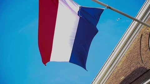 Flag of Netherland in the wind of Amsterdam Stock Footage 90408527