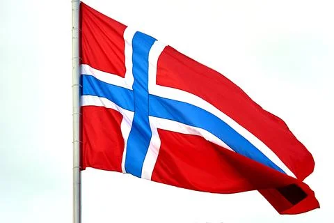 The flag of Norway hangs on the flagpole Stock Photos