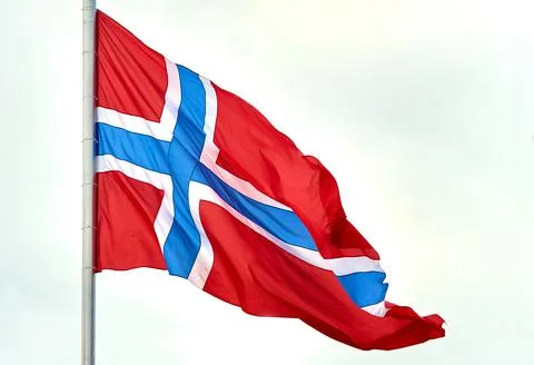 The flag of Norway hangs on the flagpole Stock Photos