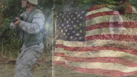 Flag overlay showing over frame, flash causing two troops bracing aiming Stock Footage 328225087
