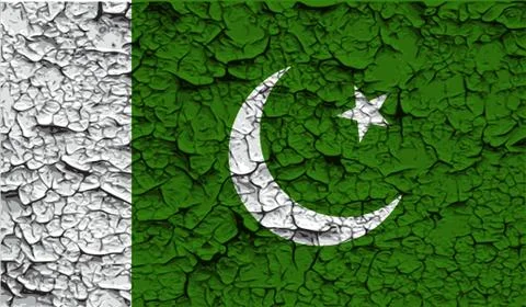 Flag of Pakistan with old texture. Vector Stock Illustration