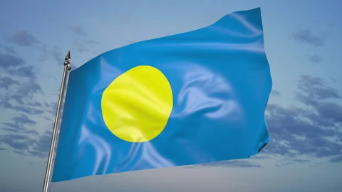 Flag of Palau on a flagpole. 3D animation against a blue sky with clouds Видео 205004860