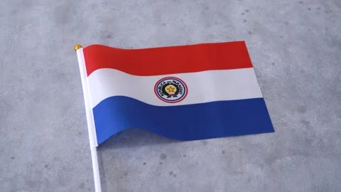 Flag of Paraguay with grey background. Orbiting shot. Stock Footage 331648494
