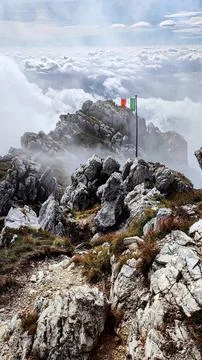 Flag on the peak Stock Photos