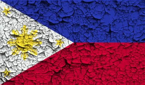 Flag of Philippiines with old texture. Vector Stock Illustration