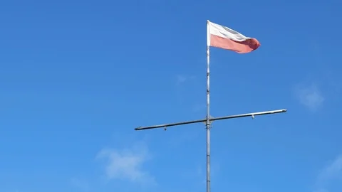 Flag of poland in the wind against sky Stock Footage 94990826