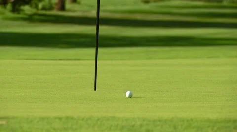 Flag pole on golf course Stock Footage 54592943