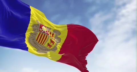 Flag of the Principality of Andorra waving on a clear day 스톡 동영상 246736804