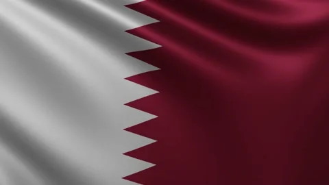 The flag of Qatar flutters in the wind close-up, the national flag of Qatar Stock Footage 219481146