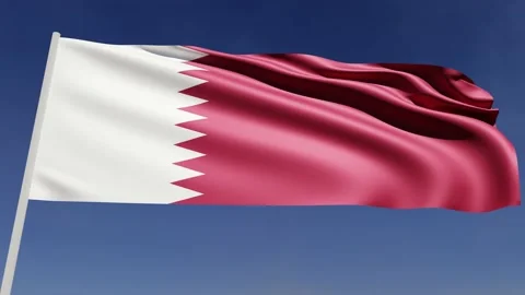 Flag of Qatar is flying in the wind on the blue sky. Realistic 3D rendering. Stock Footage 221650031