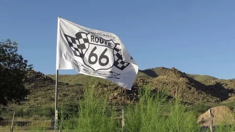 Flag reads Get your kicks on US Route 66 Highway in northern Arizona 스톡 동영상 80106122