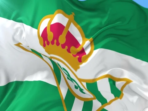 Flag of Real Betis football waving at wind, loop Stock Footage