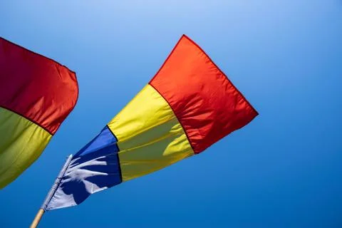 The flag of Romania in the wind Stock Photos